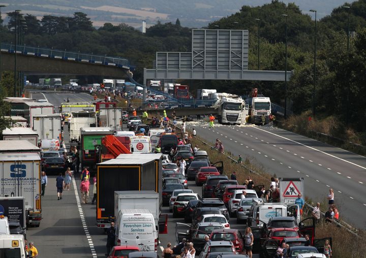 The scene on the M20 motorway after a lorry hit a motorway bridge, causing it to collapse.