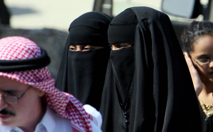 Saudi women wearing the head-to-toe Islamic covering 