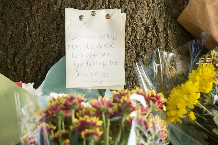 Floral tributes are left on Lennard Road in Penge.