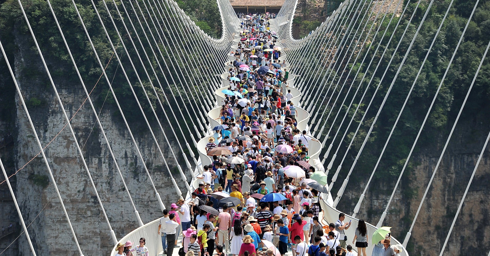 China's RecordBreaking Glass Bridge Is So Popular, It Had To Close