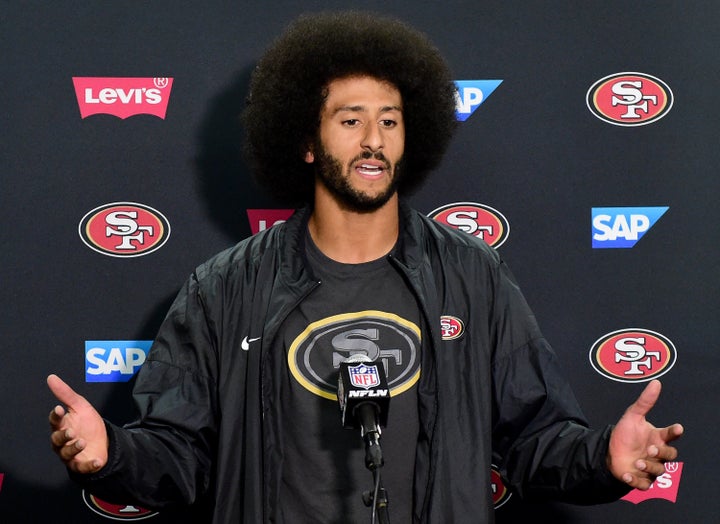 49ers quarterback Colin Kaepernick addresses the media on Thursday night. During the press conference, he said he would donat