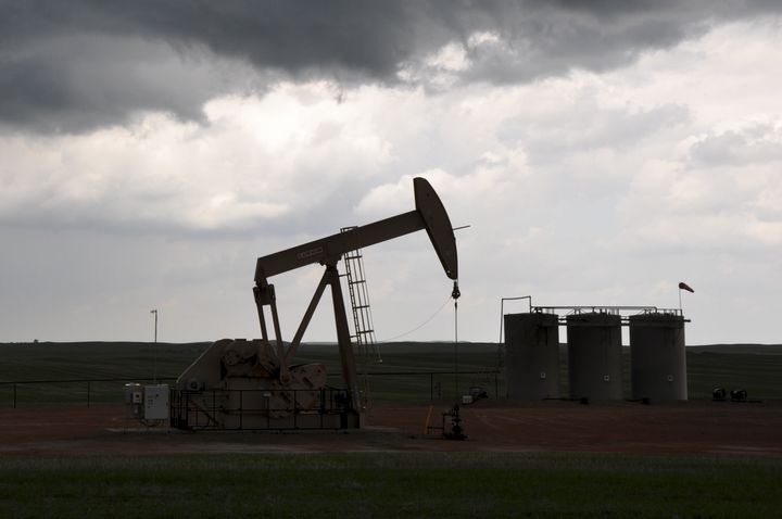 A pumpjack oil pump stands near Watford City, North Dakota, U.S., on Saturday, May 28, 2016. For most of the past decade, North Dakota has been the economic envy of every state in America posting the lowest jobless rate, the highest increase in personal income, and the fastest-growing populationall thanks to a historic oil boom. Now with crude prices at 13-year North Dakotas economy is shrinking, employment is falling fast, and the state is imposing the deepest spending cuts in its history.