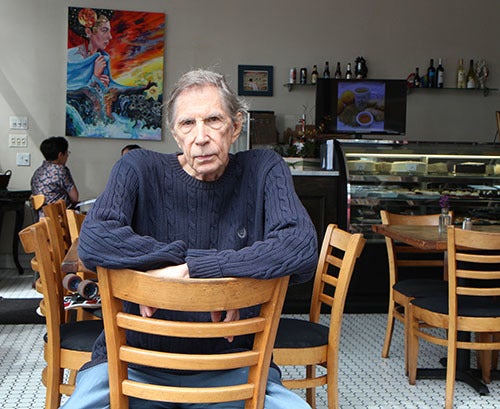 <i>Photo by Nancy A. Ruhling</i><br><strong>He's a regular at Astor Bake Shop.</strong>