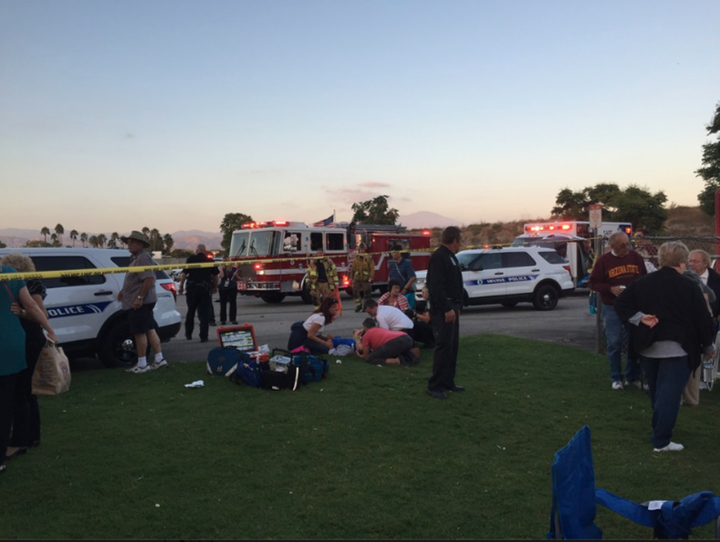 Emergency workers respond to the scene outside the Irvine Meadows Amphitheatre.