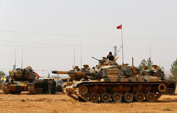 Turkish army tanks and military are stationed in Karkamis on the Turkish-Syrian border in the southeastern Gaziantep province
