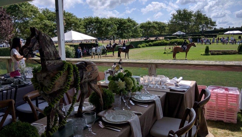 Tables in the VIP tent overlook the riding rings