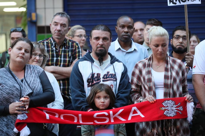 People attend a vigil in Harlow to pay tribute to Arkadiusz Jozwik