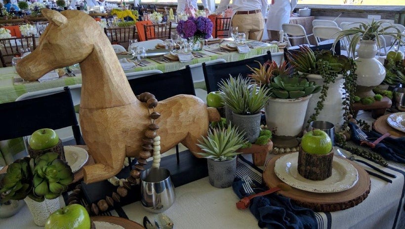 HC&G awarded First Place to table by Campbell Stables decorated with horses and apples