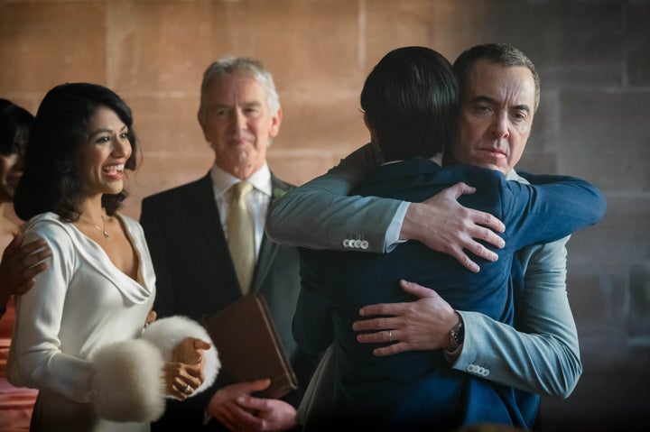 <strong>The happiest day of his life? Adam receives his friends' congratulations after tying the knot with Angela</strong>