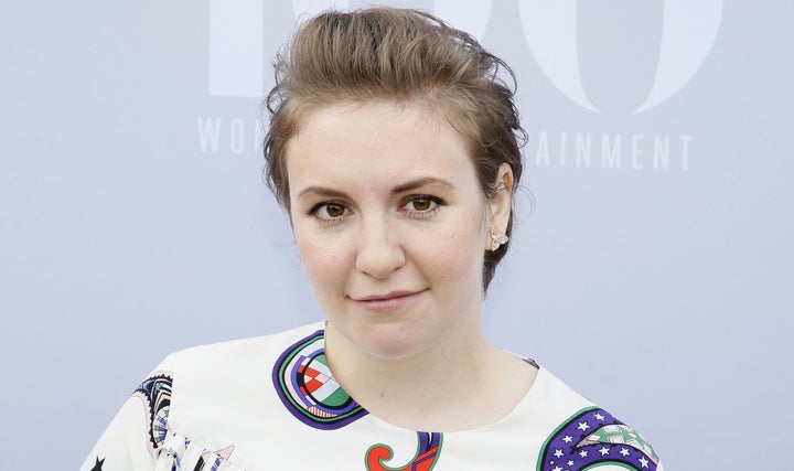 Lena Dunham poses at The Hollywood Reporter's Annual Women in Entertainment Breakfast in Los Angeles.