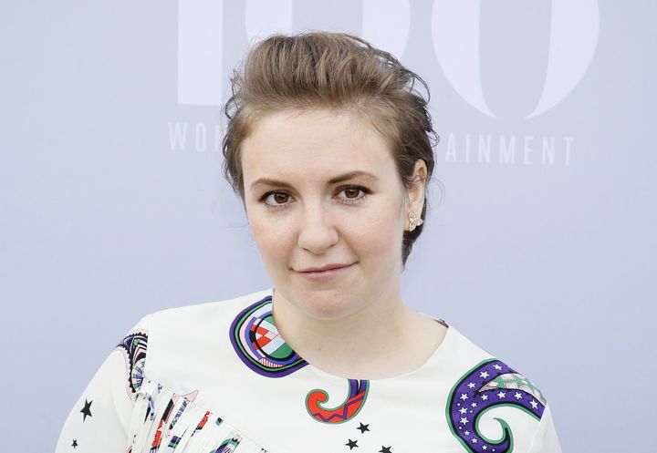 Lena Dunham poses at The Hollywood Reporter's Annual Women in Entertainment Breakfast in Los Angeles.