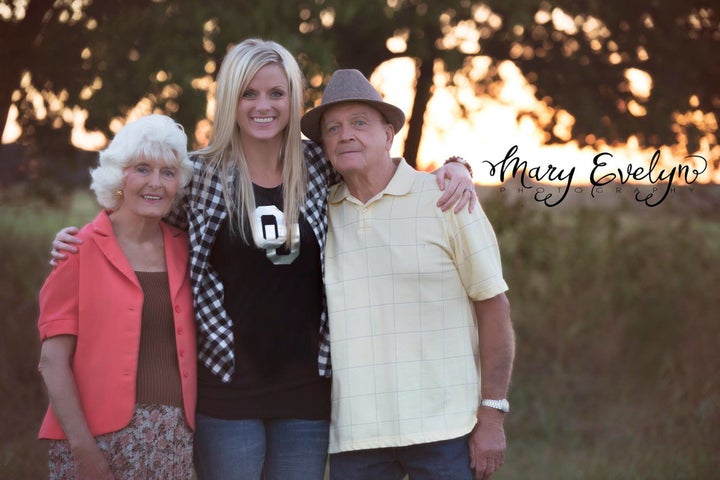 The Elmores with their granddaughter Amber Elmore-Christ. 