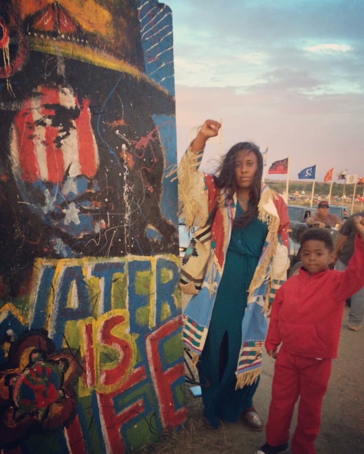 <i>Yonasda Lonewolf, the Oglala Lakota and Black woman who first went through the fence to talk to construction workers said