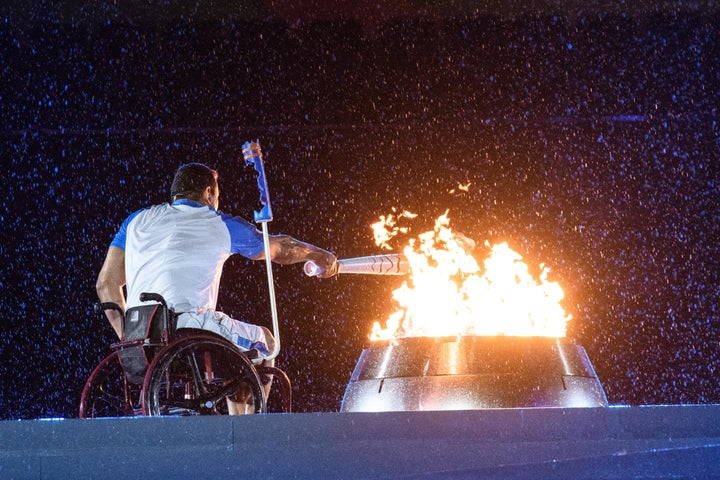 The last torch-bearer lights the Paralympic cauldron