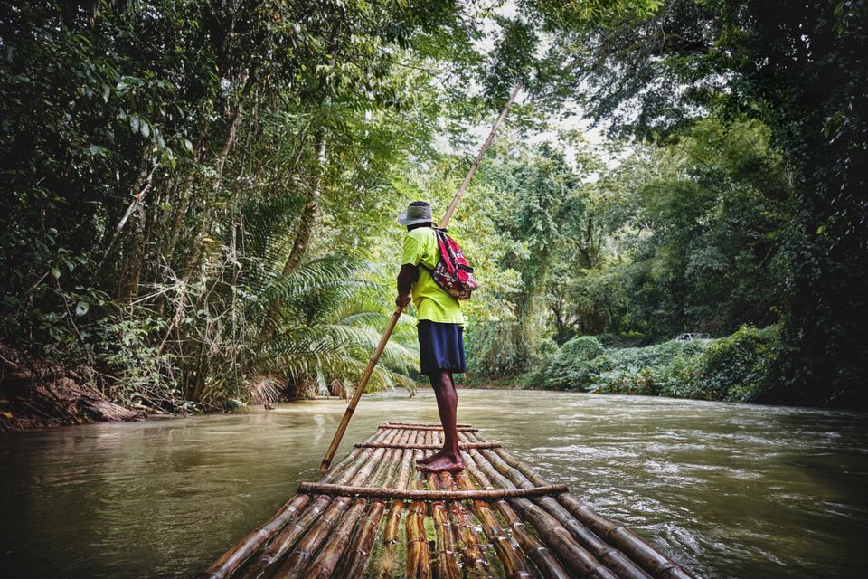 Delve into Jamaica’s lush forests on a raft cruise