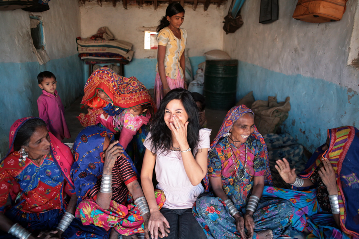 <strong>Minney with Bangladeshi garment makers.</strong>