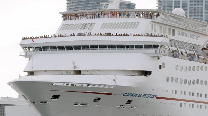 A 32-year-old passenger aboard the Carnival cruise ship Ecstasy, pictured here, fell overboard southwest of the Bahamas on Wednesday, authorities say.