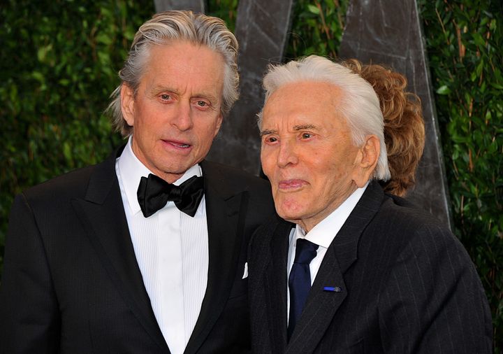 Michael and Kirk Douglas arrive at the 2012 Vanity Fair Oscar Party in Los Angeles.