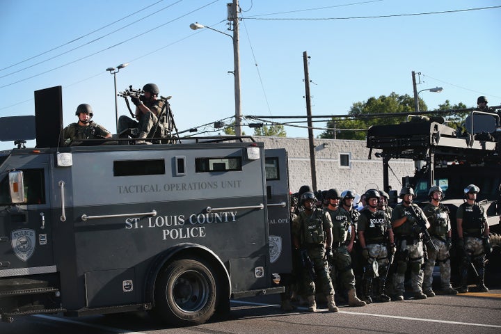 Police stand watch on Aug. 13, 2014, during the Ferguson protests.