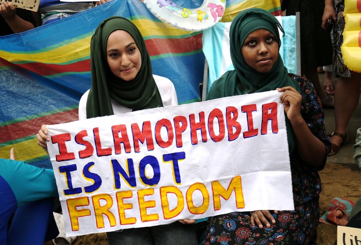 Protesters in Britain demonstrate against France's burkini ban outside the French Embassy in London.