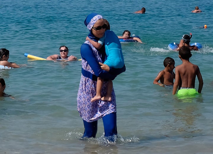 A woman wearing a burkini visits a beach in Marseille, France, on Aug. 27, 2016. France's heated debate over the piece of swimwear has engulfed political and public discourse.