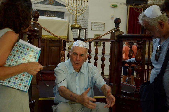 Sami Modiano spends his summers talking to tourists in Greece about the Holocaust. He believes he survived in order to keep t
