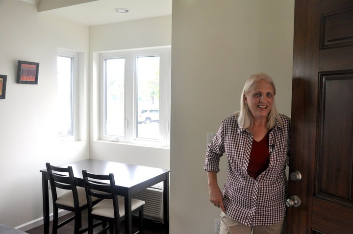 Rev. Faith Fowler, the executive director of Cass Community Social Services, stands in the nonprofit's first completed tiny home in Detroit, Thursday, September 8, 2016.