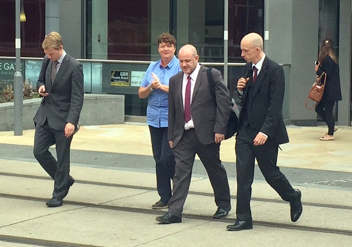 West Midlands Police constable Beth Walker (second left) was sacked for attacking her mother's love rival at an Asda store