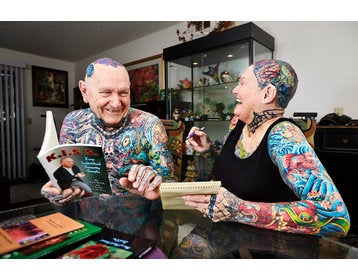senior couple breaks world record for most tattoos on the body