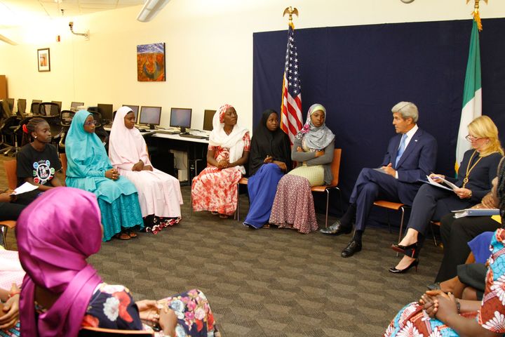  U.S. Secretary of State John Kerry, joined by U.S. Ambassador-at-Large for Global Women's Issues Catherine Russell and Assistant Secretary of State for African Affairs Linda Thomas-Greenfield, meets with a group of young women, including Amina Yusuf (pictured third from left), on August 24, 2016, in the Rosa Parks Room at the U.S. Embassy in Abuja, Nigeria. 