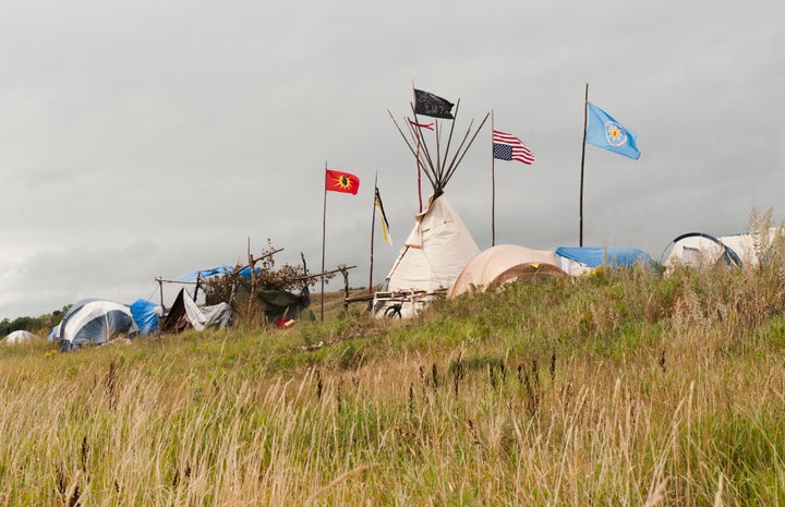 Tepees stand in the Seven Council camp, one of three encampments that have grown on the banks of the Cannon Ball River over t