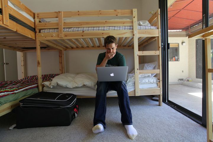 Phillip Cohen in the bedroom of a “hacker hostel” in Menlo Park, Calif.