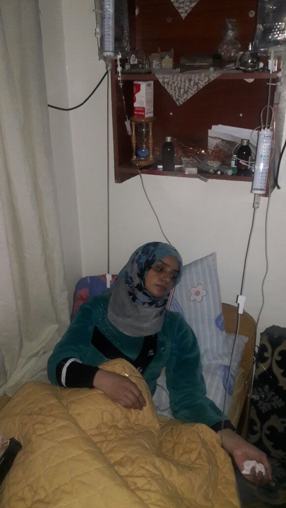 Khawalah Jabir, a Syrian mother of three, contracted meningitis from her son Yaman.