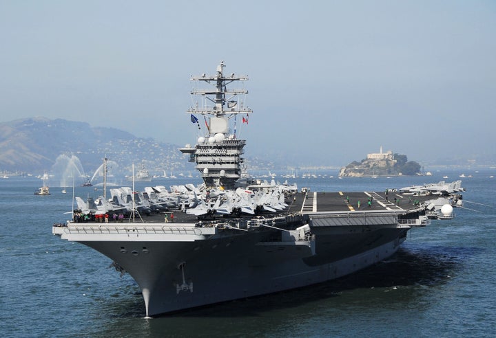 A handout picture released by the US Navy dated 07 October 2006 shows the aircraft carrier USS Nimitz as it enters San Francisco Bay during the Parade of Ships event.