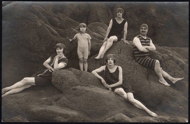 A family poses at the beach circa 1920.