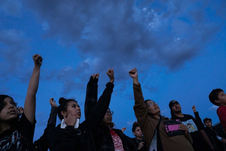 Protesters rise together against the pipeline's construction.