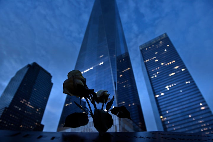 A view of One World Trade Center from the North Pool, which marks the former site of the North Tower of the World Trade Center, at Ground Zero the night before the 15th anniversary of the September 11, 2001, terrorist attacks.