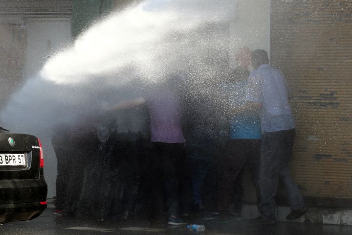 Turkish riot police use water cannon to disperse Kurdish demonstrators protesting against the removal of the local mayor from office over suspected links with Kurdish militants, in Diyarbakir, Turkey, September 11, 2016