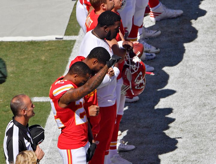Kansas City Chiefs defensive back Marcus Peters raises his fist in the air as the National Anthem plays before Sunday's football game against the San Diego Chargers.
