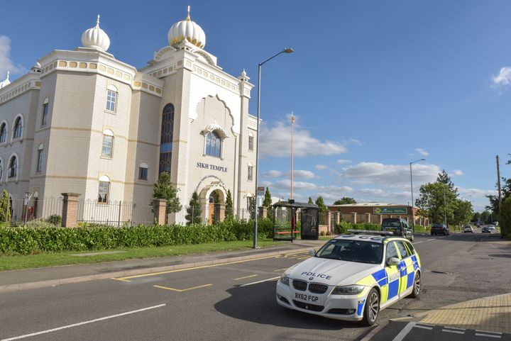 A police car outside the temple in Leamington Spa