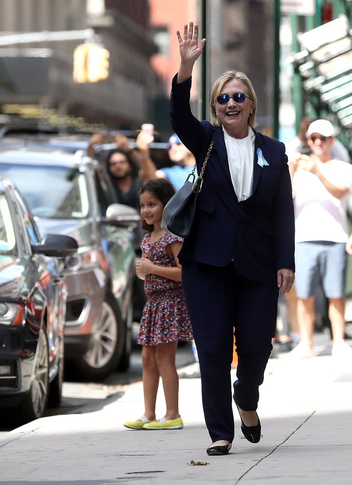 <strong>'Feeling great!': Hours later a sprightly Clinton was seen leaving her daughter Chelsea's nearby home</strong>