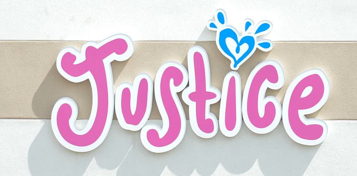 <p>A general view of a Justice (Justice: Tween Clothing & Fashion For Girls) logo seen in South Edmonton Common. a retail power centre located in Edmonton, Alberta.</p>