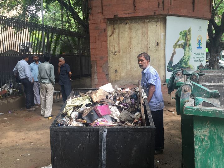 Ragpicker at waste collection site set to be demolished by NDMC. Delhi, India