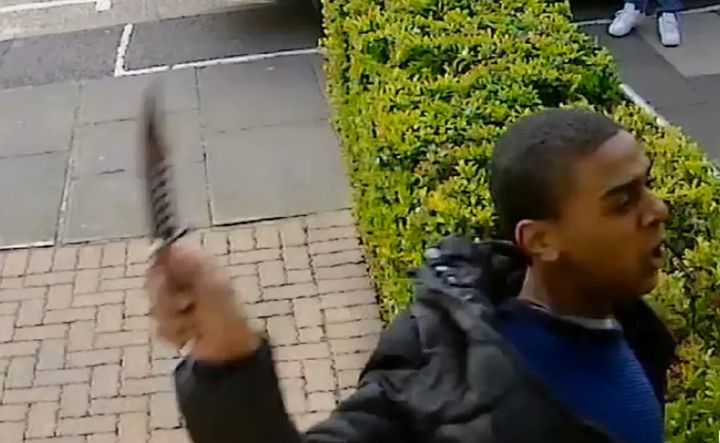 The man caught on CCTV slashing a 21-year-old man across the face with a knife