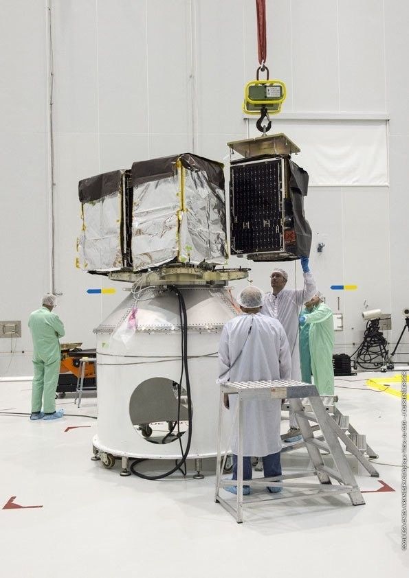 Satellite getting mounted in its MLB (mechanical light bands)