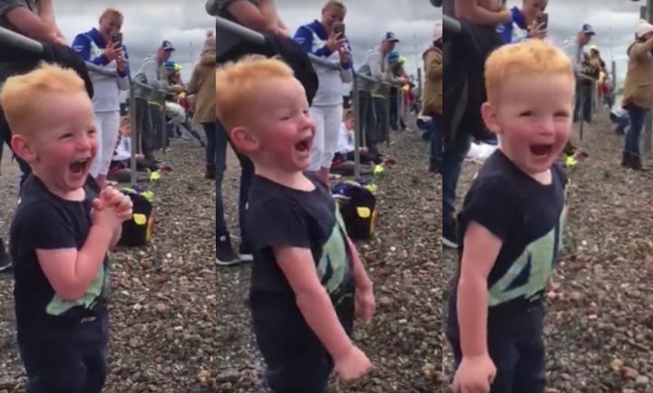 A 2-year-old boy named Logan cannot contain his excitement while watching an action-packed motor race in England earlier this month.