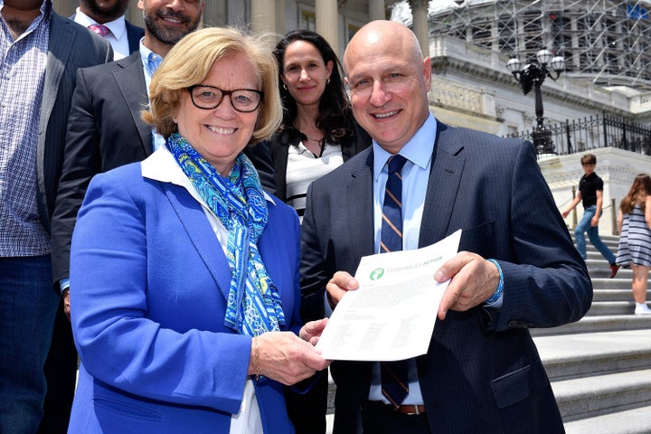 Chef Tom Colicchio (R) with Rep. Chellie Pingree (D-Maine) on Capitol Hill during a day of action on food waste reduction this May.