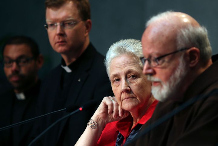 Marie Collins, member of the Pontifical Commission for the Protection of Minors, watches as Cardinal Sean Patrick O'Malley speaks during their briefing at the Holy See press office at the Vatican May 3, 2014.