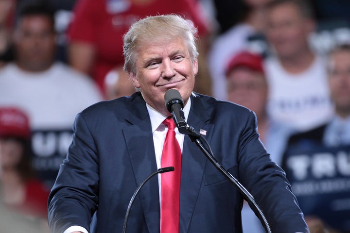 Donald Trump speaking with supporters