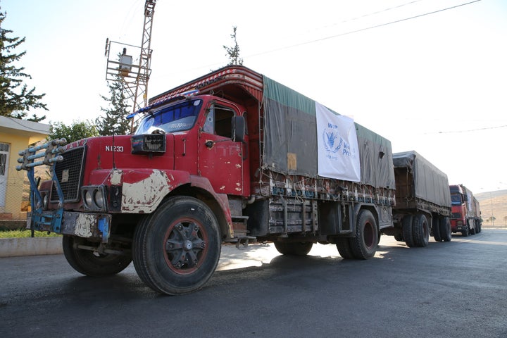 A&nbsp;World Food Programme convoy carrying humanitarian aid to Syria's Aleppo sits at the Cilvegozu Border Gate in Hatay, Tu